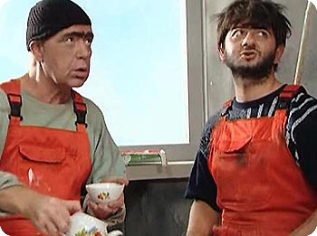 Maenner in Arbeitshosen